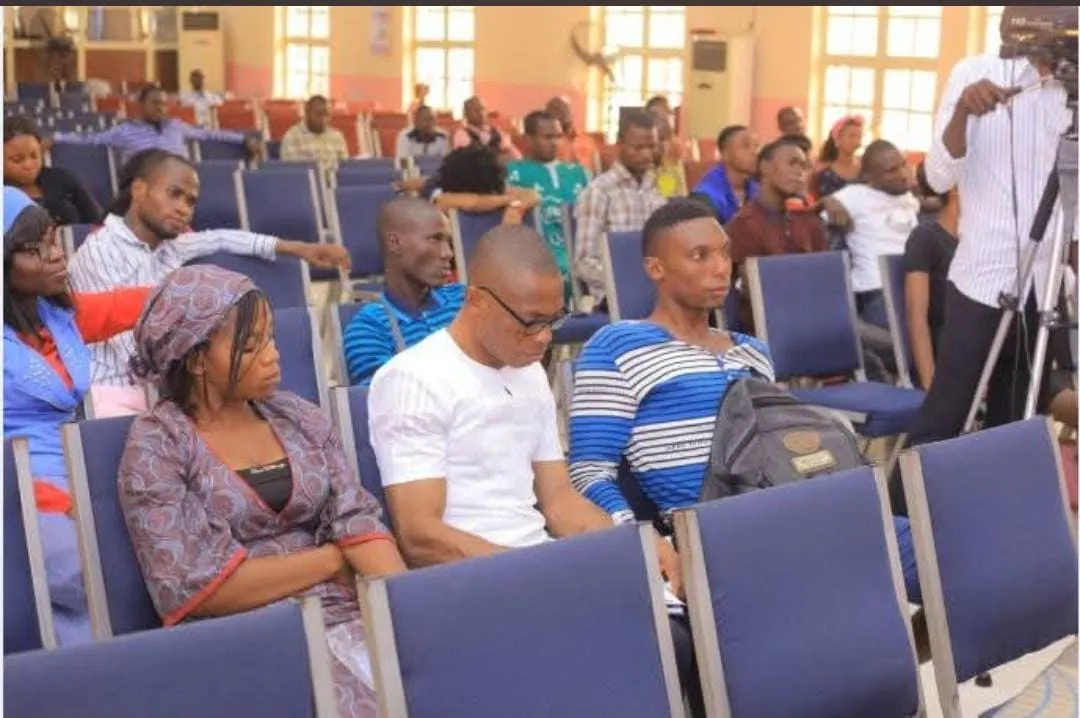Attendees seated and listening during a seminar